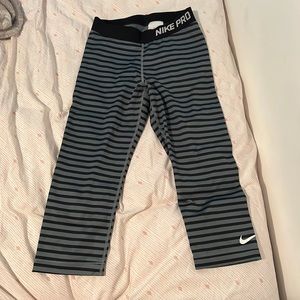 Blue/gray striped Nike 3/4 leggings